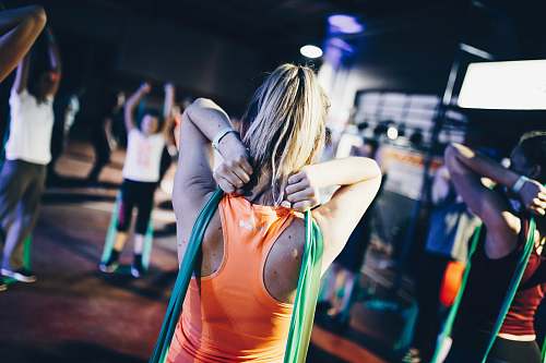 night life woman holding green rope at her back night club